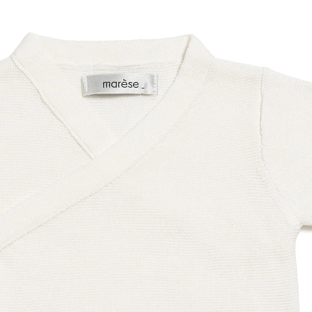 Brassière bébé en tricot écru