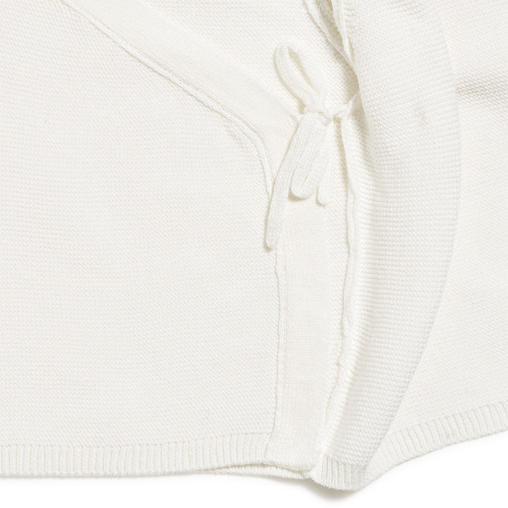 Brassière bébé en tricot écru
