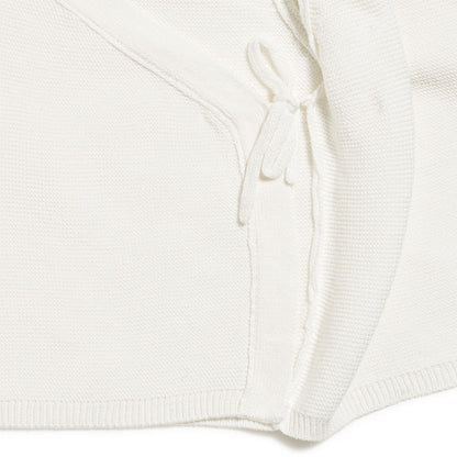 Brassière bébé en tricot écru