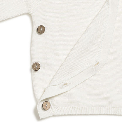 Brassière bébé en tricot écru