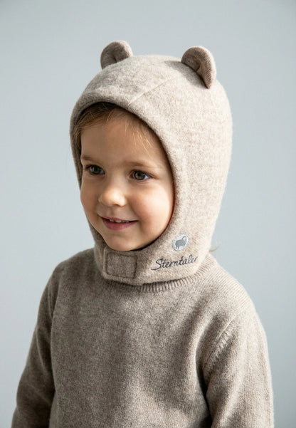 Bonnet en mérinos avec fermeture velcro et petites oreilles