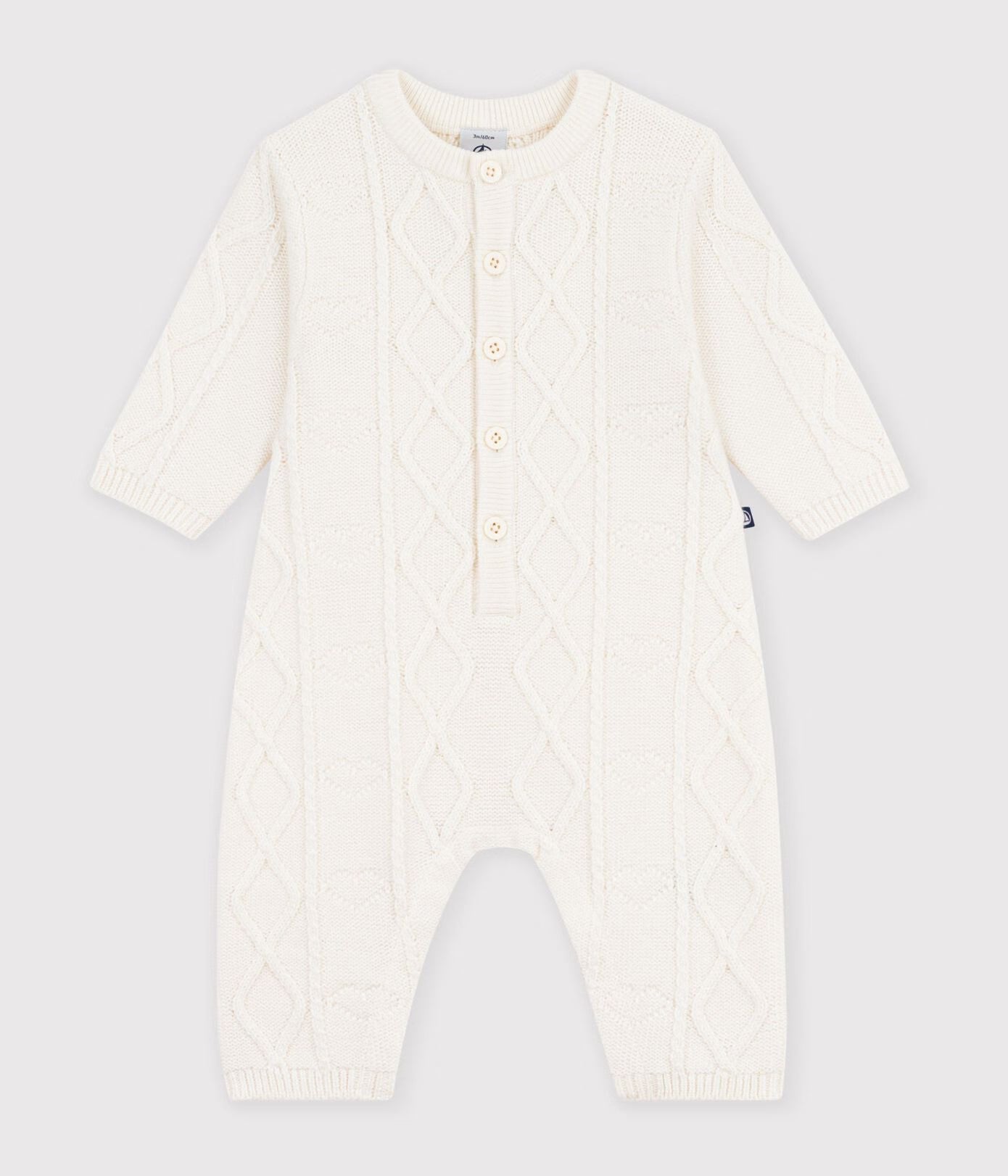 Combinaison bébé en tricot